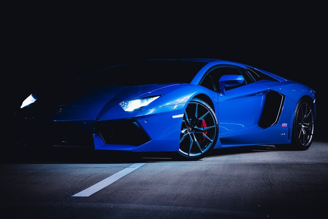 blue-ferrari-458-italia-on-black-background-1-lxisue3f4